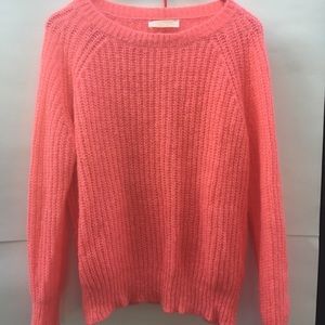 peach-colored sweater, made in Italy